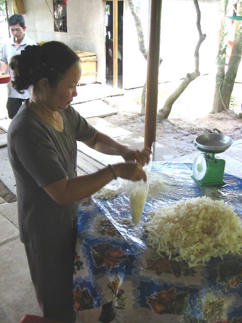 Weighing and bagging
            coconut confections